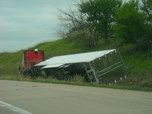 truck accident on the side of a high way