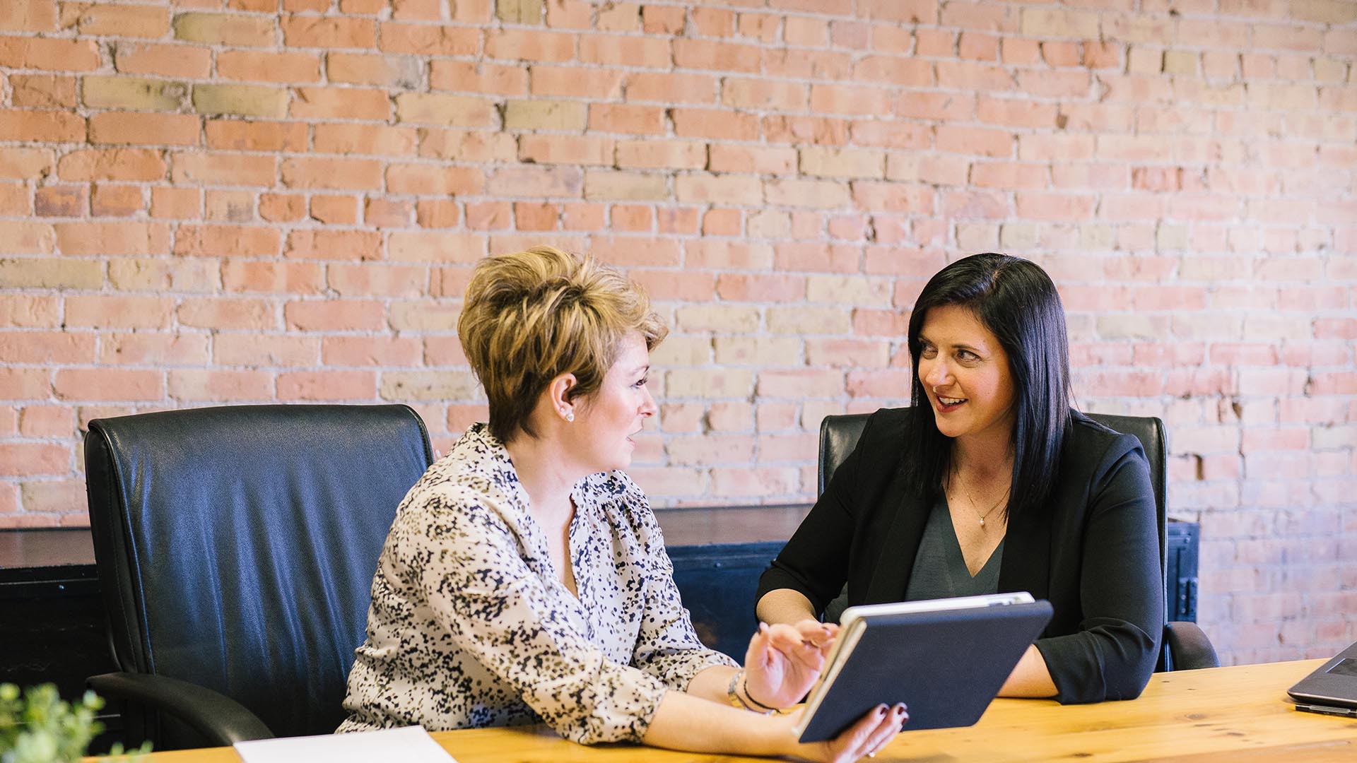 lawyer and client discussing insurance claims