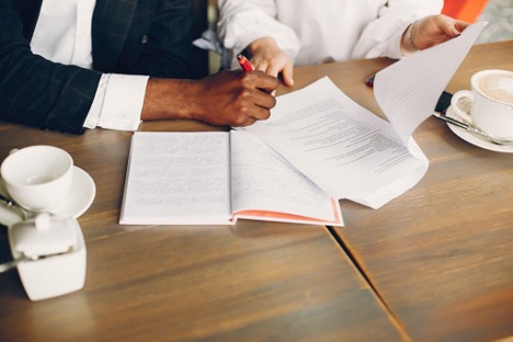 person signing papers