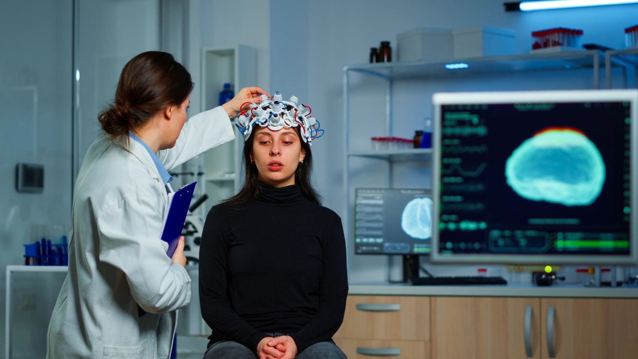 doctor checking the patient for brain damage